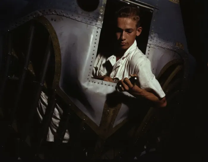 Framed Print : Working inside the nose of a PBY, Elmer J. Pace is learning the... Corus Christi, Texas, 1942. Creator: Howard Hollem Framed Print : Working inside the nose of a PBY, Elmer J. Pace is learning the... Corus Christi, Texas, 1942. Creator: Howard Hollem