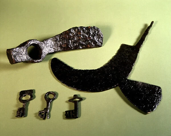 Working tools: hoe, ax and keys. From Pamplona