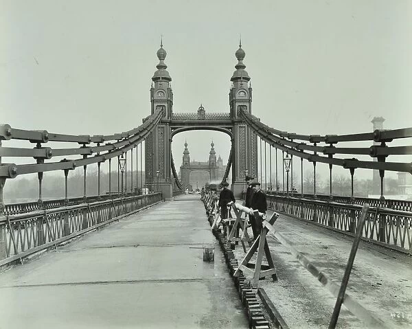 Workmen on old Chelsea Bridge, London, 1921
