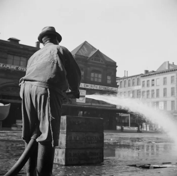 Framed Print : Workmen from the sanitary department flushing the street in front of the Fulton... New York, 1943. Creator: Gordon Parks Framed Print : Workmen from the sanitary department flushing the street in front of the Fulton... New York, 1943. Creator: Gordon Parks