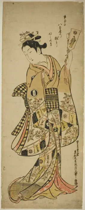 Framed Print : Yaoya Oshichi holding a battledore paddle, c. 1744  /  51. Creator: Okumura Masanobu