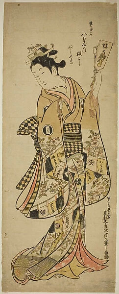 Yaoya Oshichi holding a battledore paddle, c. 1744  /  51. Creator: Okumura Masanobu