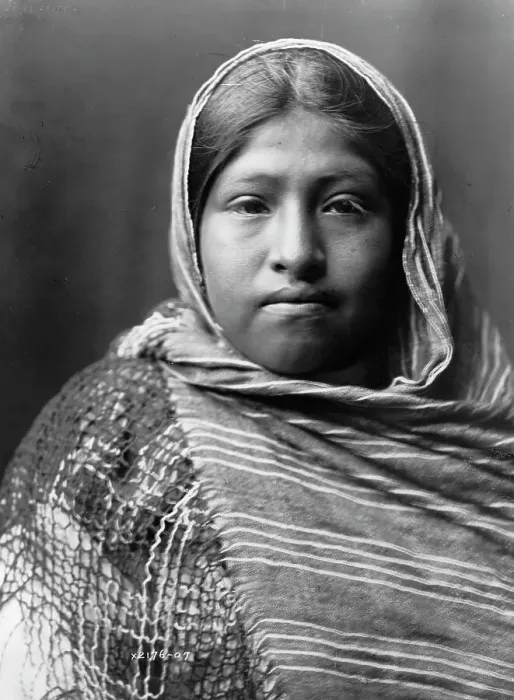 Framed Print : Yaqui girl, head-and-shoulders portrait, facing front, with striped shawl draped around... c1907. Creator: Edward Sheriff Curtis Framed Print : Yaqui girl, head-and-shoulders portrait, facing front, with striped shawl draped around... c1907. Creator: Edward Sheriff Curtis