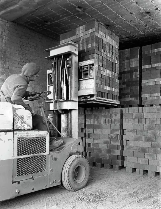 Framed Print : A yardsman stacking pallets of bricks, Whitwick Brickworks, Coalville, Leicestershire, 1963