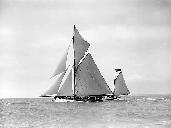 The yawl Joyce sailing in good wind, 1911. Creator: Kirk & Sons of Cowes