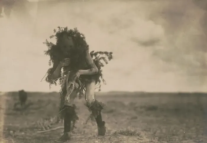Framed Print : Yeibichai, the beggar, Tonenili-Navajo Indian, dressed in spruce branches, 1904, c1905. Creator: Edward Sheriff Curtis Framed Print : Yeibichai, the beggar, Tonenili-Navajo Indian, dressed in spruce branches, 1904, c1905. Creator: Edward Sheriff Curtis