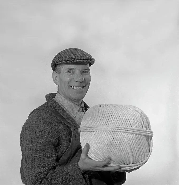 Framed Print : Yorkshireman wearing a flat cap and holding a large ball of twine, 1968 Framed Print : Yorkshireman wearing a flat cap and holding a large ball of twine, 1968