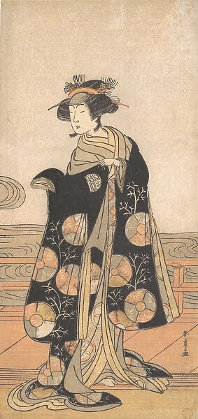 Yoshizawa Iroha as a Woman Standing on the Engawa of a House by a River, ca. 1778. Creator: Shunsho