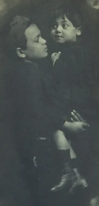 Framed Print : Young boy holding a smaller child, c1900. Creator: Elizabeth B. Brownell Framed Print : Young boy holding a smaller child, c1900. Creator: Elizabeth B. Brownell