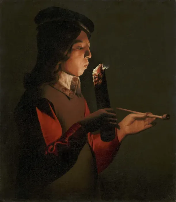 Framed Print : A young boy with a pipe, blowing on a firebrand, 1645-1648 Framed Print : A young boy with a pipe, blowing on a firebrand, 1645-1648