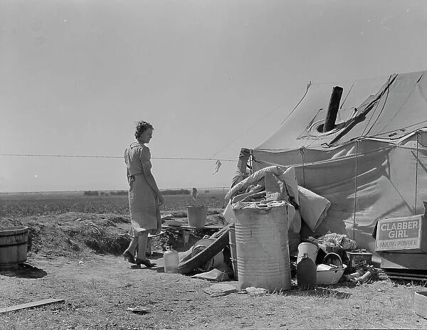 Young family just arrived from Arkansas camped along the road, Imperial Valley, California, 1937. Creator: Dorothea Lange