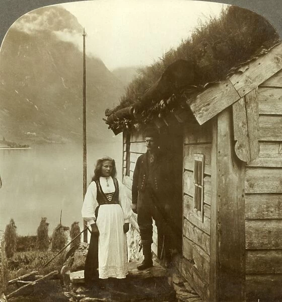Young farmers of the Nordfjord country - before their cottage home, Norway, c1905