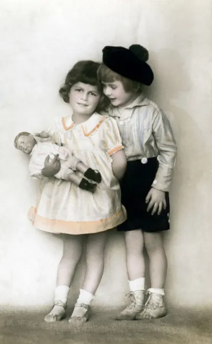 Framed Print : A young girl and boy, early 20th century Framed Print : A young girl and boy, early 20th century