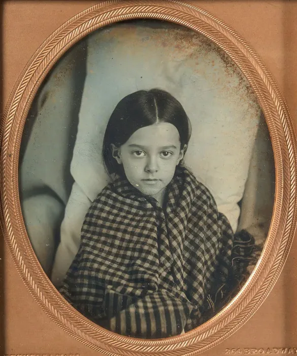 Framed Print : [Young Girl Wearing Gingham Shawl, Resting on Pillow], 1853-56