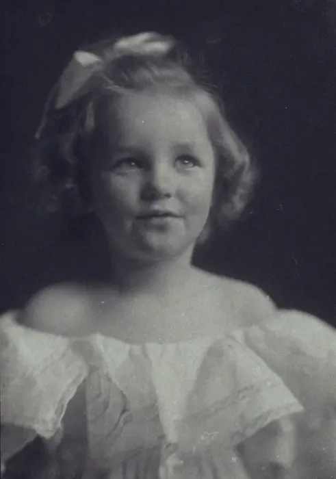 Framed Print : Young girl in a white off-the-shoulder dress with a ribbon in her hair, c1900. Creator: Anne K Pilsbury Framed Print : Young girl in a white off-the-shoulder dress with a ribbon in her hair, c1900. Creator: Anne K Pilsbury