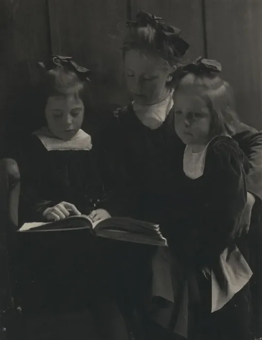 Framed Print : Three young girls reading a book, c1900. Creator: Gertrude Kasebier