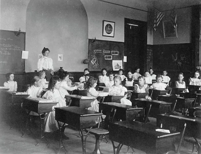 Framed Print : Young girls seated at desks in Washington, D.C. classroom, (1899?). Creator: Frances Benjamin Johnston