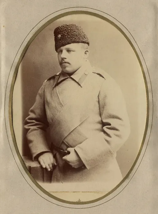 Framed Print : A young man in a fireman's uniform (overcoat and hat), late 19th cent - early 20th cent Creator: Shnee Framed Print : A young man in a fireman's uniform (overcoat and hat), late 19th cent - early 20th cent Creator: Shnee
