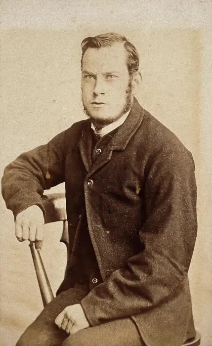 Framed Print : A young man, seated, with an intense expression in his eyes, c1890s. Creator: John Davis Framed Print : A young man, seated, with an intense expression in his eyes, c1890s. Creator: John Davis