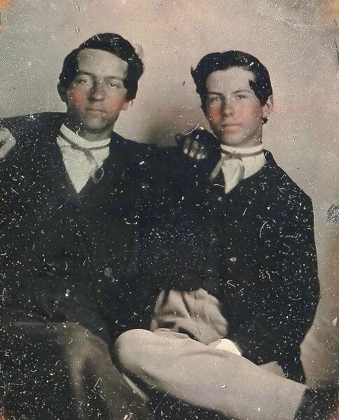 Two Young Men Seated with Their Arms Around Each Other, 1860s. Creator: Unknown