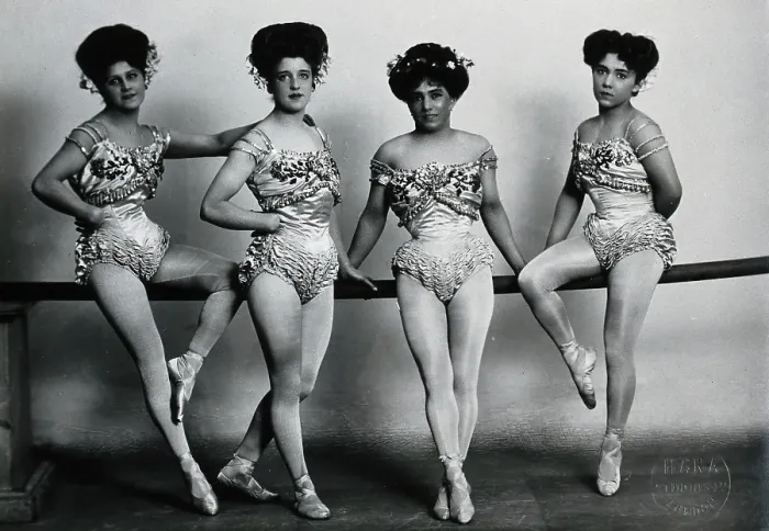 Framed Print : Four young woman acrobats (?), posing on a bar in a photographic studio, between 1899 and 1908. Creator: Unknown Framed Print : Four young woman acrobats (?), posing on a bar in a photographic studio, between 1899 and 1908. Creator: Unknown