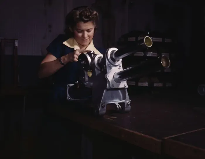 Framed Print : A young woman employee of North American Aviation, Incorporated... Inglewood, Calif. 1942. Creator: Alfred T Palmer Framed Print : A young woman employee of North American Aviation, Incorporated... Inglewood, Calif. 1942. Creator: Alfred T Palmer