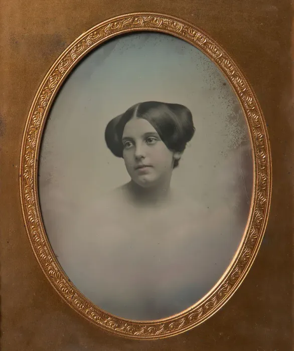 Framed Print : Young Woman with Hair Styled in Two Buns, 1850s. Creators: Josiah Johnson Hawes Framed Print : Young Woman with Hair Styled in Two Buns, 1850s. Creators: Josiah Johnson Hawes
