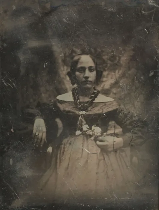 Framed Print : Young woman holding a flower, ca. 1842. Creator: Joseph Philibert Girault De Prangey Framed Print : Young woman holding a flower, ca. 1842. Creator: Joseph Philibert Girault De Prangey