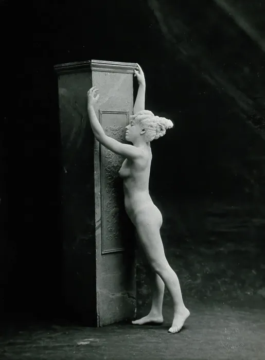 Framed Print : A young woman, posing naked in a classical attitude, against a square column... c1890 / 1910. Creator: Unknown Framed Print : A young woman, posing naked in a classical attitude, against a square column... c1890 / 1910. Creator: Unknown