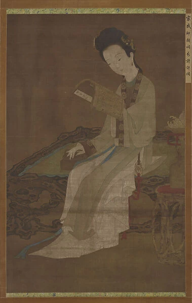 Young woman reading a book of poems, Ming dynasty, 16th-17th century. Creator: Unknown