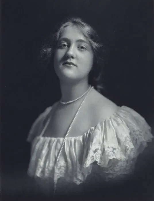 Framed Print : Young woman wearing an off-the-shoulder dress and long pearl necklace, looking front... c1900. Creator: F. Gercher Framed Print : Young woman wearing an off-the-shoulder dress and long pearl necklace, looking front... c1900. Creator: F. Gercher