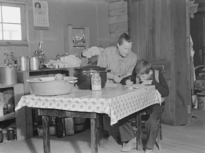 Framed Print : The youngest Wardlow boy copies out a recipe for his mother, Dead Ox Flat, Oregon, 1939. Creator: Dorothea Lange Framed Print : The youngest Wardlow boy copies out a recipe for his mother, Dead Ox Flat, Oregon, 1939. Creator: Dorothea Lange