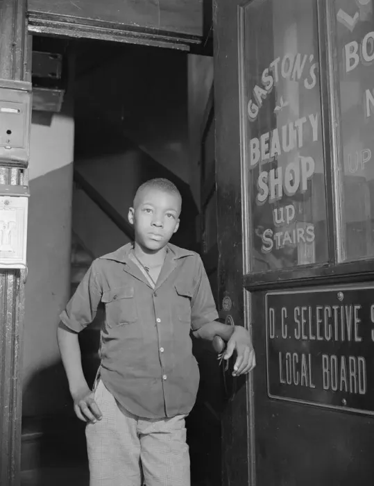 Framed Print : Youth waiting for a newspaper delivery truck, Washington, D. C. 1942. Creator: Gordon Parks Framed Print : Youth waiting for a newspaper delivery truck, Washington, D. C. 1942. Creator: Gordon Parks