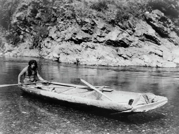 Framed Print : Yurok canoe on Trinity River, c1923. Creator: Edward Sheriff Curtis