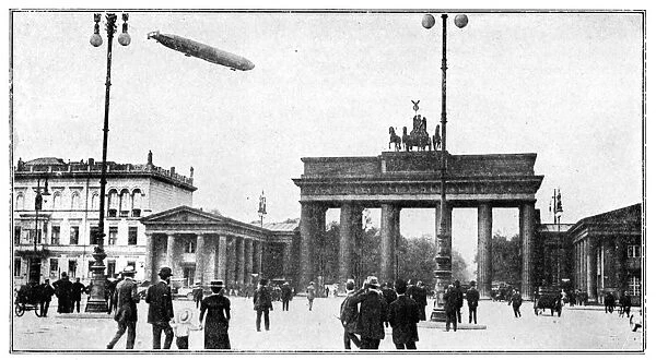 Zeppelin airship passing over Brandenburg Gate, Berlin, First World War, 1914