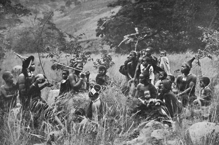 Framed Print : A Zulu musician and audience, 1912 Framed Print : A Zulu musician and audience, 1912