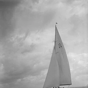 The 12 Metre bermuda rig sailing yacht Westra, 1936. Creator: Kirk & Sons of Cowes