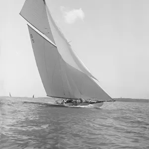 The 15 Metre Hispania sailing close-hauled, 1911. Creator: Kirk & Sons of Cowes