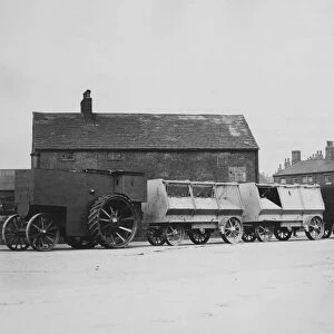 1900 Fowler F5 armoured traction engine with munitions wagons. Creator: Unknown