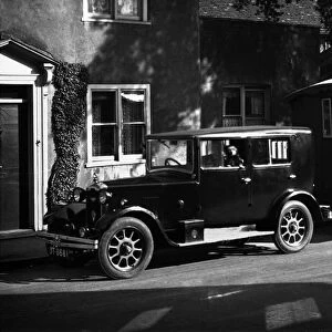 1926 Rover 10 with 1927 Lady Nimble caravan. Creator: Unknown