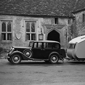 1935 Austin Light 13. 9 Ascot saloon with Winchestr Royal caravan. Creator: Unknown