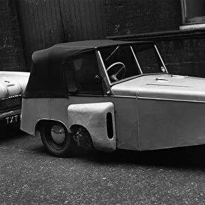 1956 Gordon 3 wheeler parked in street. Creator: Unknown