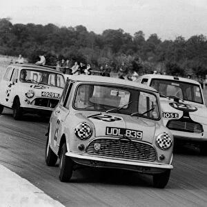1961 Austin Mini driven by J. Gibson at Silverstone. Creator: Unknown