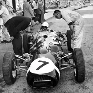 1961 Ferguson P99, Stirling Moss in pits with APR Rolt and Alf Francis. Creator: Unknown
