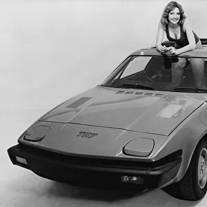1976 Triumph TR7 with female model. Creator: Unknown