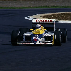 1987 British Grand Prix, Silverstone. Nigel Mansell wins in Williams FW11B. Creator: Unknown