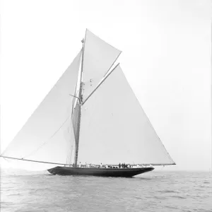 The 221 ton gaff-rigged cutter Britannia sailing under spinnaker, 1913. Creator