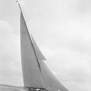 The 23-metre cutter Astra sailing close-hauled, 1932. Creator: Kirk & Sons of Cowes
