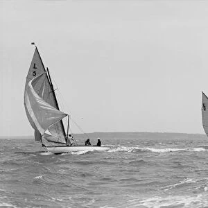 The 6 Metre Snowdrop and Correnzia racing downwind, 1911. Creator: Kirk & Sons of Cowes