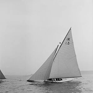 The 7 Metre Ancora (K3) sailing close-hauled, 1913. Creator: Kirk & Sons of Cowes